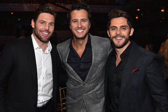 Pictured (L-R): Mike Fisher, Luke Bryan, Thomas Rhett. Photo: John Shearer/Getty Images for CMT