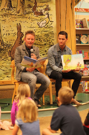 Chris Tomlin and Pat Barrett read Good Good Father during a Nashville launch event.