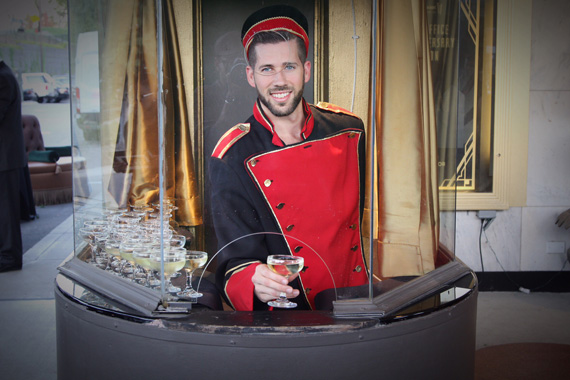 Guests were greeted with champagne served through the ticket booth window.