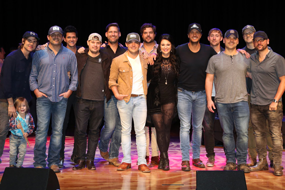 Pictured (L-R): Ross Copperman, Rhett Akins, Michael Carter, Jody Stevens, Tommy Cecil, Cole Taylor, Dallas Davidson, Jaida Dreyer, Luke Bryan, Ashley Gorley, Jon Nite, Luke Laird, and Chris DeStefano. Photo: Photo: Alan Poizner