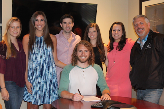 Pictured (L-R): Katie Barolak, Kelly Bolton, Dave Pacula, Nick Wayne, attorney Kelly Donley, attorney Lauren Kilgore and Black River CEO Gordon Kerr. Photo: Courtesy of Black River Entertainment 