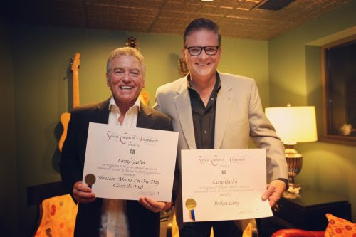 Pictured (L-R): Larry Gatlin, BMI's Perry Howard. Photo: Moments By Moser