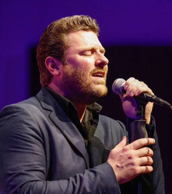 RCA Records Nashville recording artist Chris Young sang his chart-topping hit "I'm Comin' Over" to celebrate his co-writer and 2016 SESAC Songwriter of the Year, Josh Hoge. Photo: Ed Rode