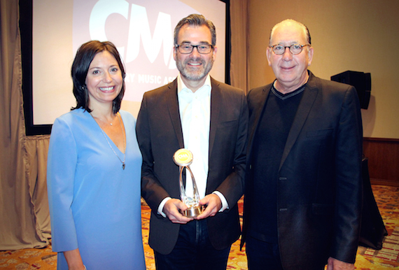 CMA Board President Sally Williams, Irving Waugh Award of Excellence recipient Steve Buchanan and CMA Board Chairman John Esposito. Photo: Christian Bottorff / CMA 