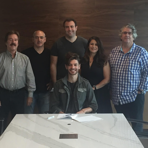 Pictured, back row (L-R): Tim Wipperman, Rezonant; Josh Green, Raven Capital Management; Jeremy Tucker, Raven Capital Management; Denise Stevens, Loeb and Loeb and Richard Orga, MusInk. Seated: Isaac Fox