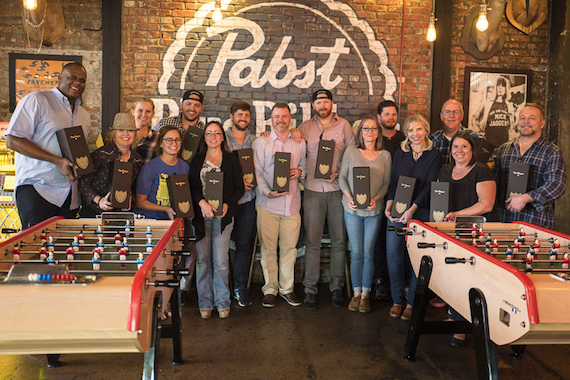 Back row (L-R: Jon Platt, Alison Junker, Travis Carter, Will Overton, Ben Vaughn, BJ Hill, Matt Michiels, Phil May. Front row (L-R): Alicia Pruitt, Jessi Vaughn, Karen Harrison-Hite, Neena Wright, Patricia Ragan-Mainello, LuAnn Inman, Steve Butler 