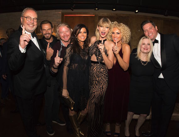 Songwriter Taylor Swift and Little Big Town celebrate "Better Man" topping the iTunes all-genre chart following the band's performance of the hit at last night's 50th Annual CMA Awards. L to R: UMGN Chairman and CEO Mike Dungan; LBTs Jimi Westbrook; LBTs Phillip Sweet; LBTs Karen Fairchild; Taylor Swift; LBTs Kimberly Schlapman; UMGN President Cindy Mabe; Sandbox Entertainments Jason Owen 