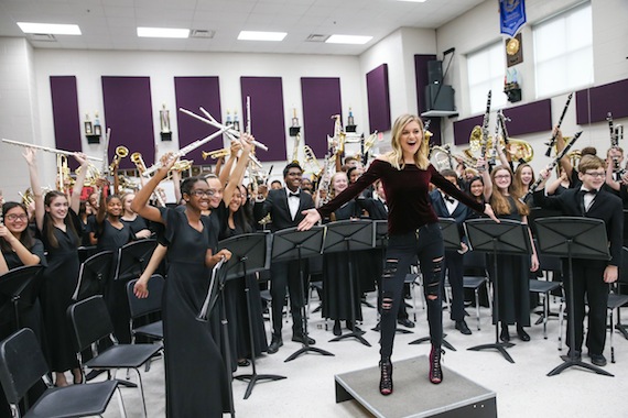 NASHVILLE, TN - DECEMBER 06: Singer-songwriter Kelsea Ballerini speaks to the Oliver Middle School wind Ensemble during the CMA Foundation's Announcement of a $1 million donation to the Metro Nashville public schools 'Music makes us' progam at Oliver Middle School on December 6, 2016 in Nashville, Tennessee. (Photo by Terry Wyatt/Getty Images)