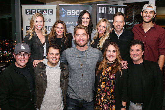 (L-R): Back Row  BMLG Records Leah Fisher, Angie Coonrod, Lauren Longbine, Liz Gregg Santana, Matthew Hargis, Andrew Thoen. Front Row  BMLG Records President Jimmy Harnen, Justin Ebach, Brett Young, Kelly Archer, BMLG President & CEO Scott Borchetta. Photo: Terry Wyatt