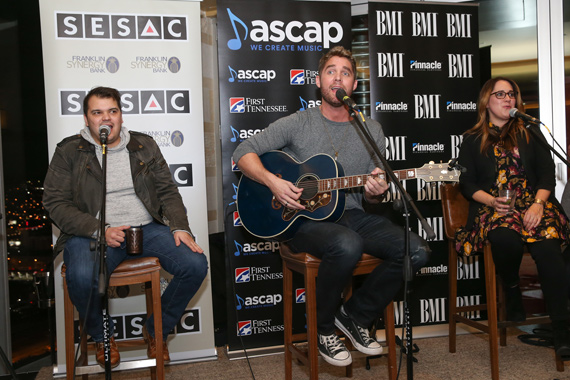 Pictured (L-R): Justin Ebach (SESAC), Brett Young (ASCAP), Kelly Archer (BMI). Photo: Terry Wyatt