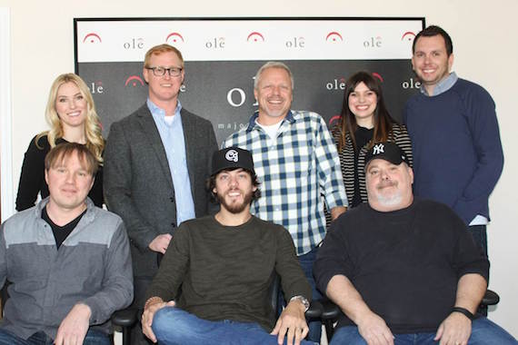 Pictured (Nack row, L-R): Shellien Kinsey, ole, Creative Coordinator; John Ozier, ole, VP Creative; Mike Whelan, ole, Sr. Creative Director; Emily Mueller, ole, Creative Manager; Ben Strain, ole, Creative Director. (Back row, L-R): Songwriter Pavel Dovgalyuk, Singer/Songwriter Chris Janson, Songwriter Mark Irwin